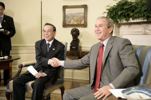 President George W. Bush and Prime Minister Phan Van Khai of Vietnam deliver statements to the media in the Oval Office Tuesday, June 21, 2005. "We discussed our economic relations. And I noted that the Vietnamese economy is growing quite substantially. We talked about our desire for Vietnam to join the WTO," said the President. "We talked about security issues and a mutual desire to coordinate in the war on terror." White House photo by Eric Draper